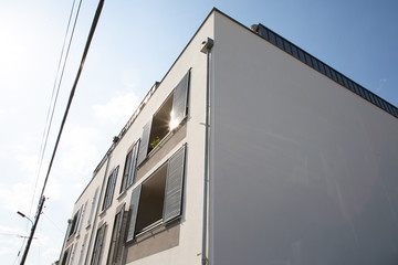 nice apartment buildings with balconies on a sunny day