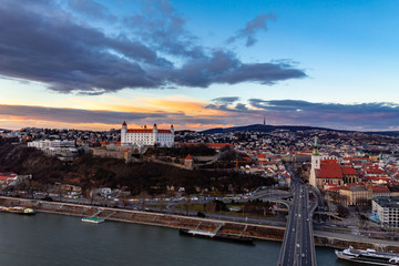 Fototapeta na wymiar Bratislava, Slovakia: aerial panorama of the old city center at sunset across the Danube river