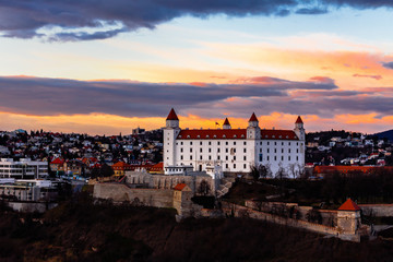 Fototapeta na wymiar Bratislava, Slovakia: aerial view of Bratislava castle standing above the old town at sunset