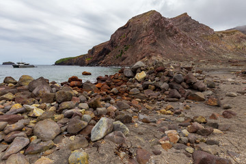 A charter boat in the Anchorage at the active Volcano 