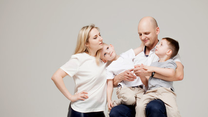 Big family, parents and sons. Mom dad and two boys