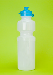 Plastic transparent bottle with blue cap for cycling and fitness