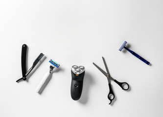 Set of male shaving accessories on white background