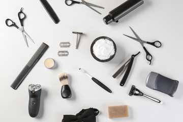 Set of male shaving accessories on white background