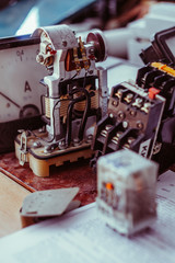 Close up photo current relay. Old electrical apparatus - current relay, analog ammeter, magnetic...