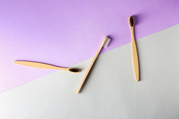 Toothbrushes on color background