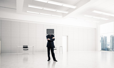 Businessman with TV instead of head.
