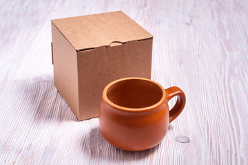 Cardboard box on wooden background