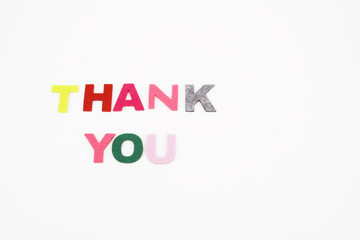 Color alphabet letter in word thank you on isolated white background