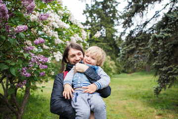Fototapeta premium Father playing with son outside