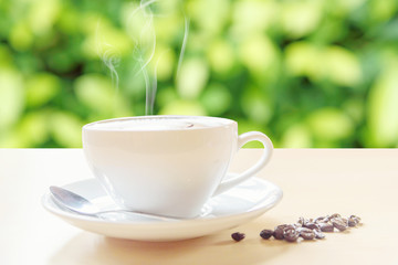 hot coffee with smoke on table