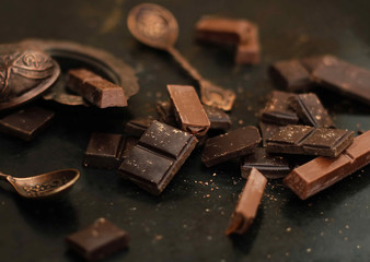 Chocolate bars on the black table