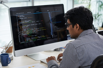 IT worker working on computer