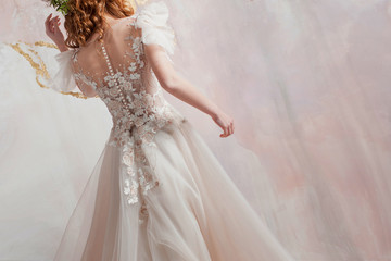 Beautiful bride,back view of girls in elegant wedding dress