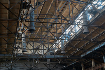 Obraz premium ceiling of old abandoned factories with windows and hoods