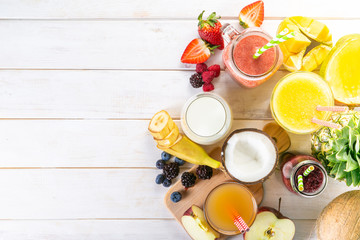 Selection of colourful smoothies in glasses with ingredients