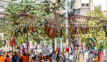Fototapeta premium Las Fallas, blurred people and firecrackers mascleta in Valencia