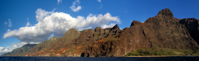 Fototapeta na wymiar View from a boat towards the famous Na Pali Coast on the northern coast of Kauai, Hawaii, USA.