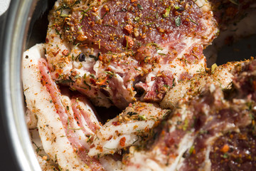  Closeup of a raw pickled lamb meat steak 
