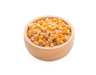 Corn seed in wooden bowl and Pile of corn seed isolated on a white background.with clipping path