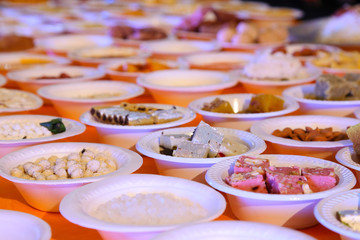 offring of sweets and other material to god - indian rituals of bhog