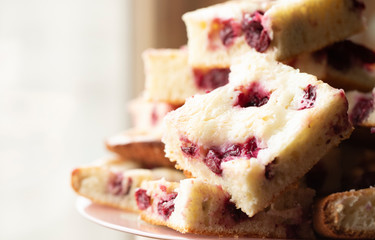 Home made cherry cake with vanilla and black cherries on window background 