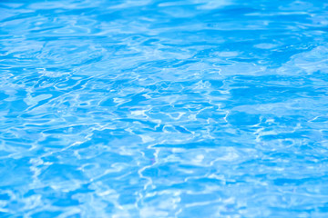 Blue swimming pool rippled water detail