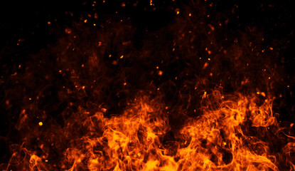 Realistic isolated fire effect for decoration and covering on black background. Concept of particles ,flame and light.