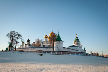 Obraz premium Old architecture of russian town. Beautiful church, domes, stone walls...