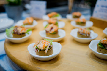 buffet food, catering food party at restaurant, mini canapes, snacks and appetizers