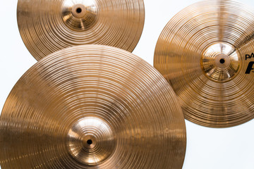 Drum plate, drum set on a white background, musical cymbals top view