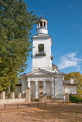 Ust–Izhora, St Petersburg. Russia. Belfry of Alexander Nevsky Orthodox Church and unique historic cobblestone pavement