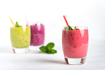 Fruit and berry smoothie blend at home on a light background