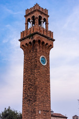 Fototapeta na wymiar Italy, Venice, tower in a square in the historic center of Murano, an island in the Venetian lagoon. 