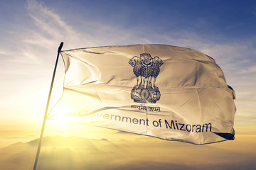 Mizoram state of India flag waving on the top sunrise mist fog