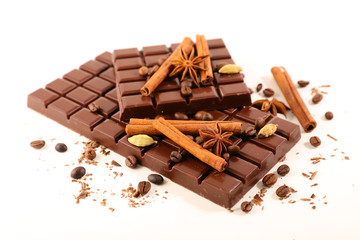 chocolate bar with spices isolated on white background