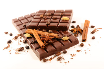 chocolate bar with spices isolated on white background