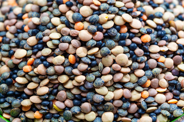 Colorful mix of lentils legumes ready for cooking, tasty vegetarian food commonly used in South Asian cuisine