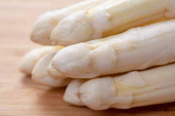 New harvest of white asparagus vegetable in spring season , washed white asparagus ready to cook, spring menu for restaurants