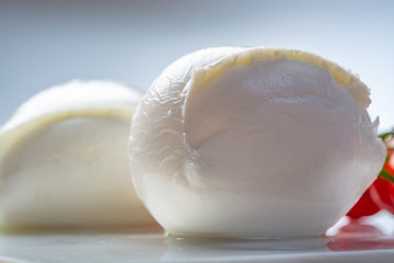 Balls of buffalo mozzarella, soft Italian scheese made from the milk of Italian Mediterranean buffalo