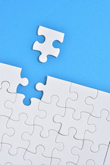 Puzzle piece on a blue background
