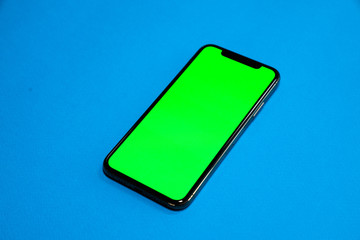 iPhone, Phone smartphone, green screen on Blue background