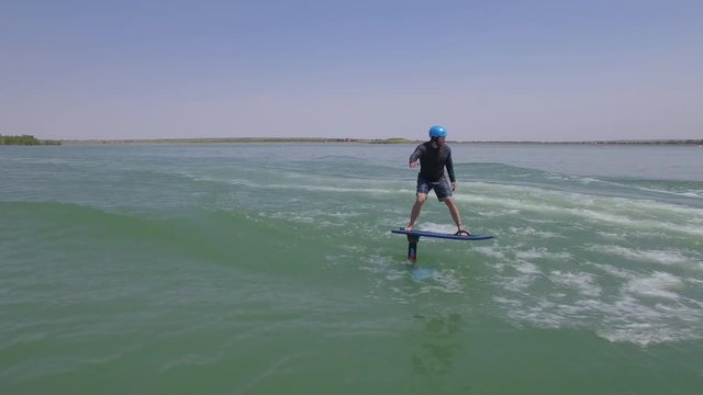 Aerial Wake Surfer Hydrofoil Wakefoil Floating Hovering Over A Colorado Lake