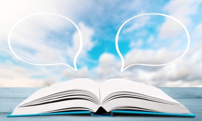 Opened book on white background.Opened book on white background.