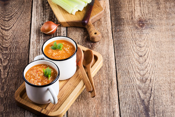 Vegan pearl barley soup with seasonal vegetables