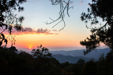 Fototapeta na wymiar Mountain Summit Overlooking The Jungle At Sunset