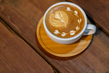 Backgrounds of Latte coffee, Coffee cup latte art in shop.