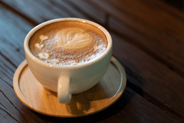 Backgrounds of Latte coffee, Coffee cup latte art in shop.