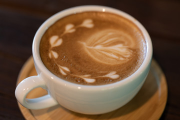 Backgrounds of Latte coffee, Coffee cup latte art in shop.
