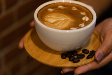 Backgrounds of Latte coffee, Coffee cup latte art in shop.